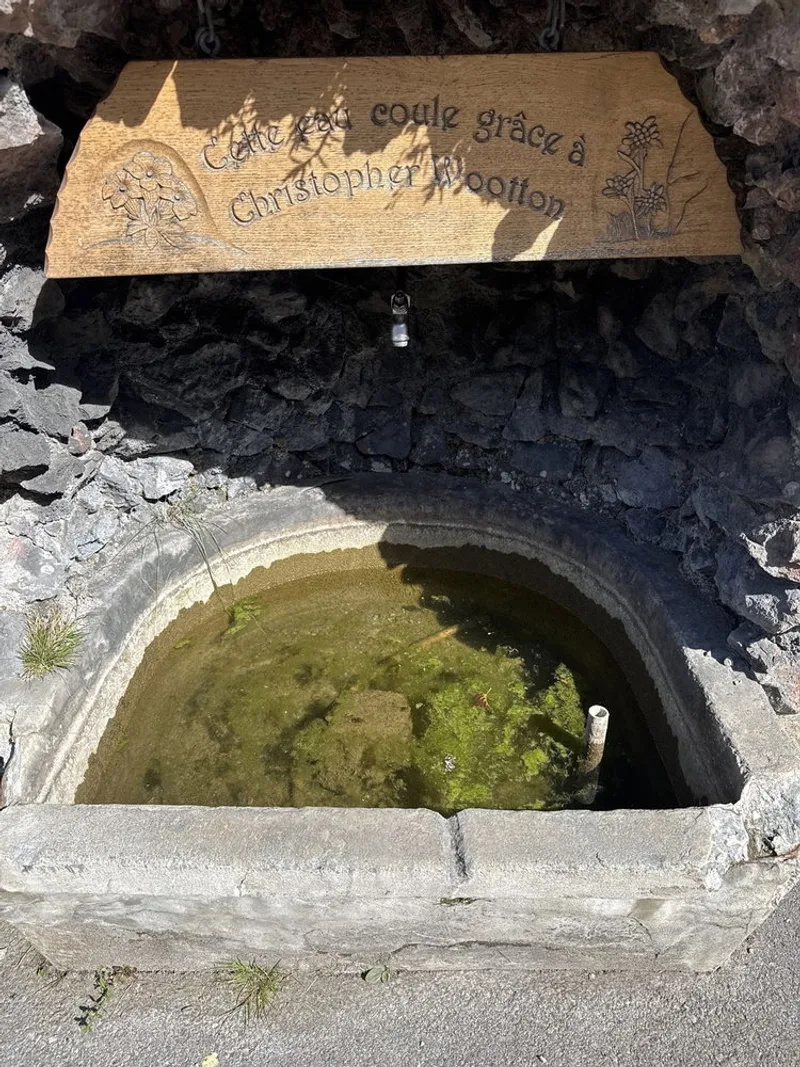 A tap in the middle of L'Etivaz, right where the road bends past the cheese dairy.